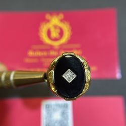 10K GOLD ONIX AND DIAMOND RING 