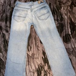 Light blue ripped baggy jeans