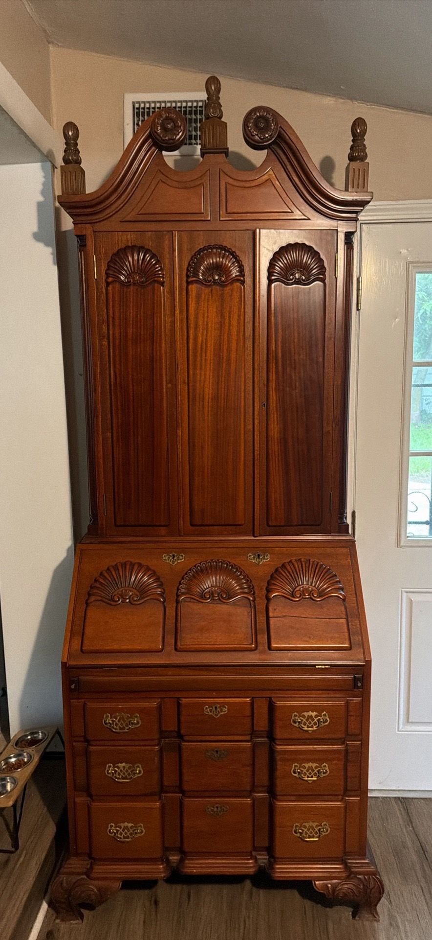 Chippendale-style block-front secretary desk and bookcase with original working key