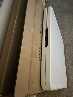 5 FT Folding in half table