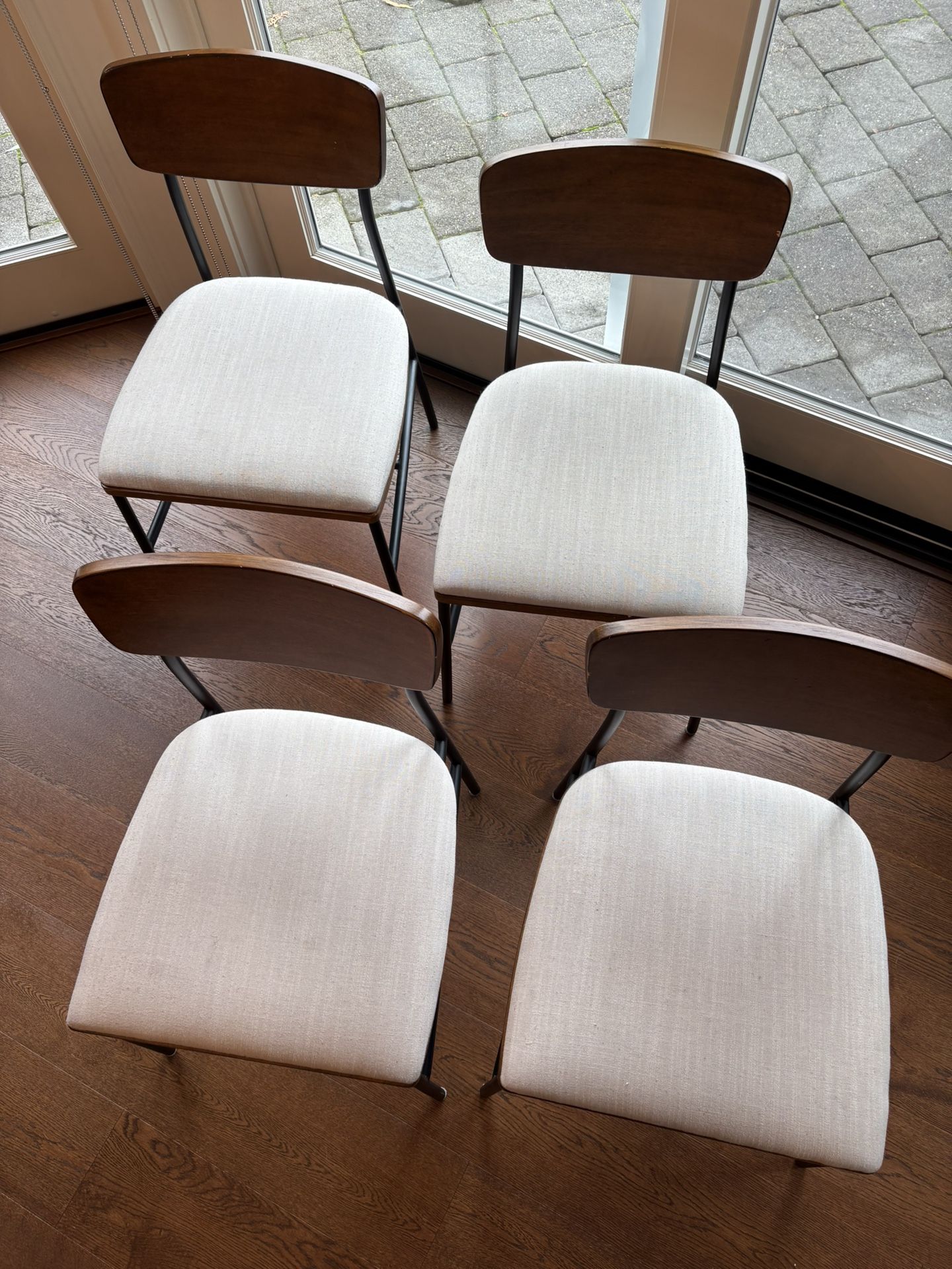 Set of four (4) mid-century modern, mixed materials dining chairs