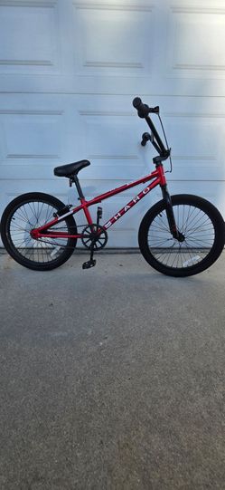 Two Haro Shredder 20 lightweight. One blue and one red.