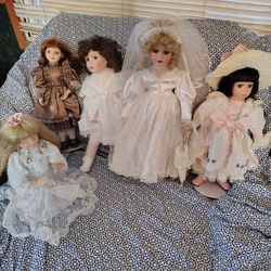 A Bunch Of Porcelain Dolls