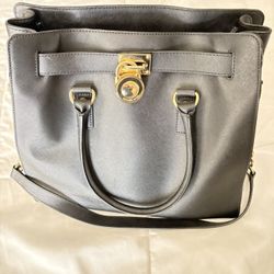 Bolsa mk grande  Como Nueva  $150