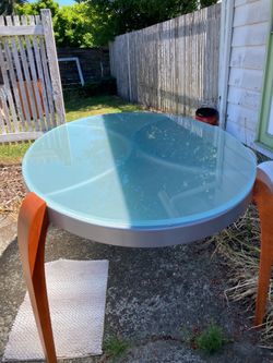 Frosted Oval Glass Top Dinette Set with a cherry-finished solid wood frame 4-chairs