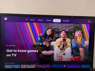 Sony Bravia 42 inch tv. With Base. With Roku remote