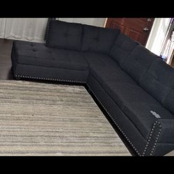 Dark GREY Sectional With Ottoman. 
