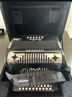 Hohner Panther brand Accordion in perfect condition—like new.