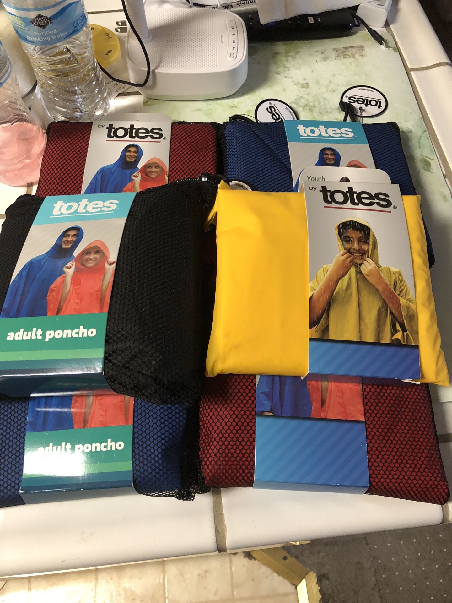 New 5 Adult & 1 Child Raincoats $5. Ea.