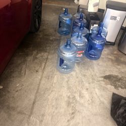 12 Water Bottles 5 Gallon Each $50 