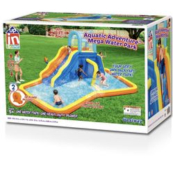 New - The Aquatic Adventure™ Mega Water Park is the ideal backyard play experience. This inflatable water park features a safe and sturdy water slide,