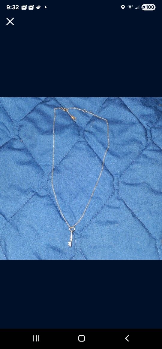 Elegant Silver Necklace With Key