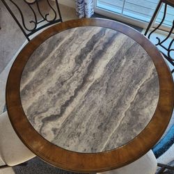 Kitchen Table with chairs and bakers rack