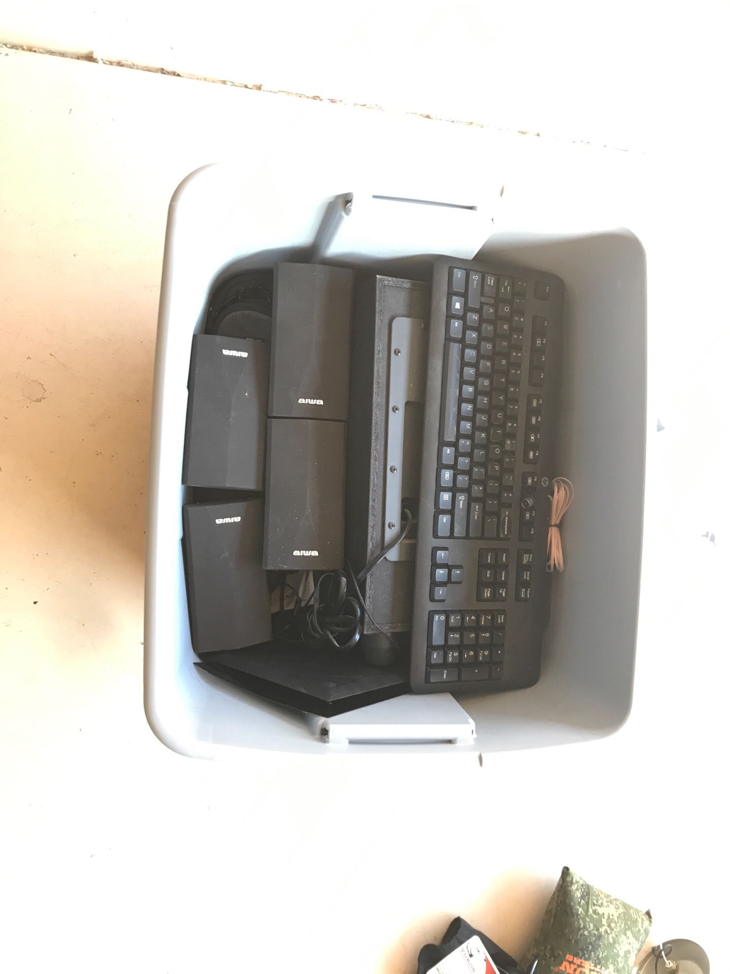 mystery box of keyboards, speakers, cables etc