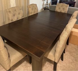 Dining table almost knew very, very clean with six chairs fabric material