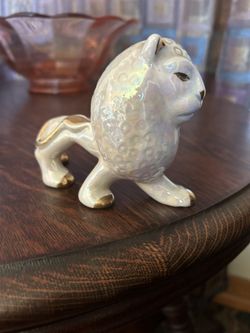 White Opalescent Lion trimmed in Gold