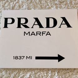 PRADA Marta wrapped canvas art. Measures 18 inches high x 24 inches wide. Some wear, see photos. 