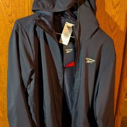 NWT Reebok training jacket, size S.