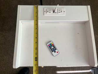White LED Nightstand with Charging Station – $25