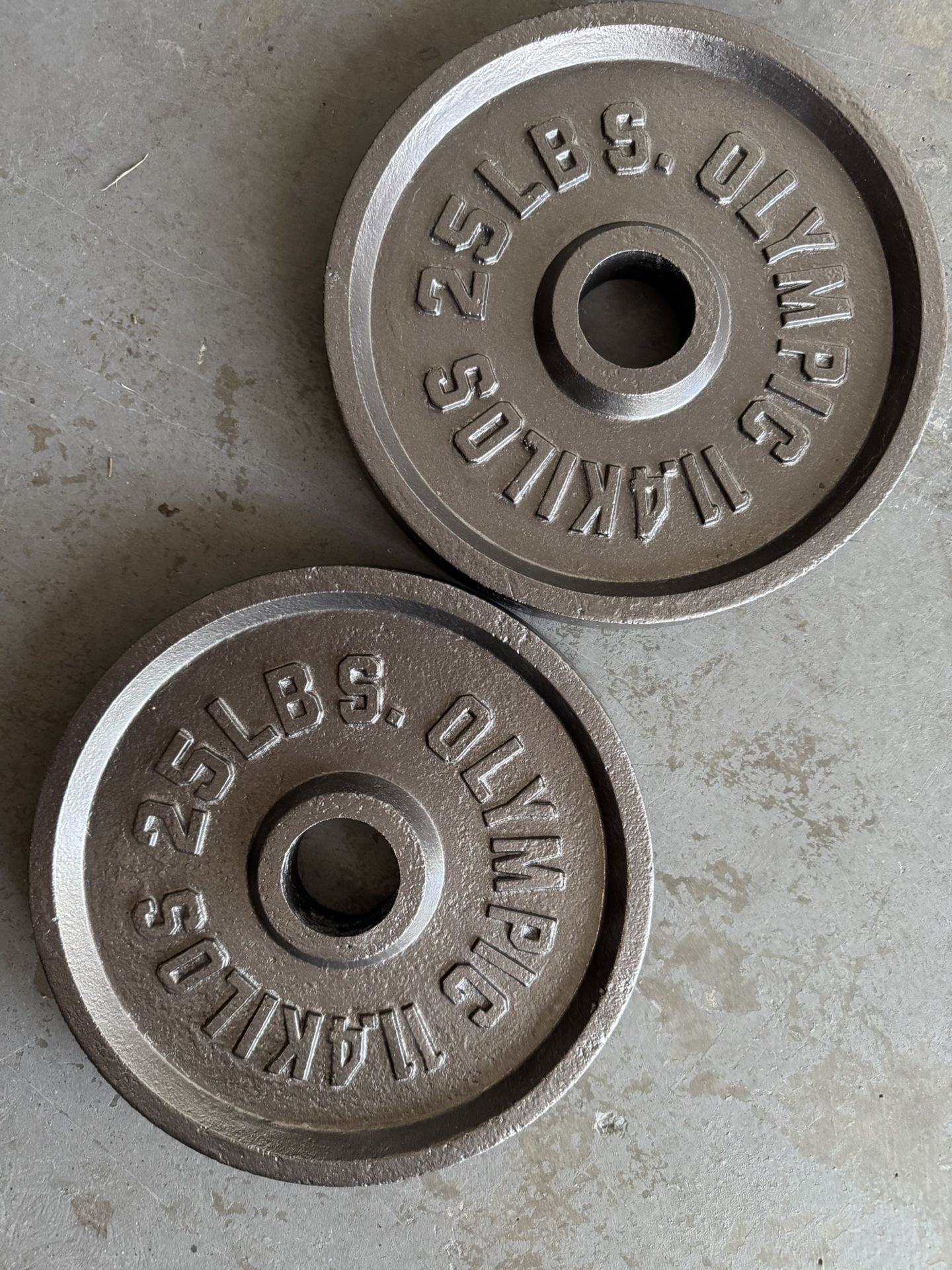 Pair Of 25 Pound Olympic Weights