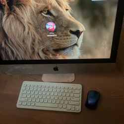 Imac With Wireless Keyboard And A Mouse
