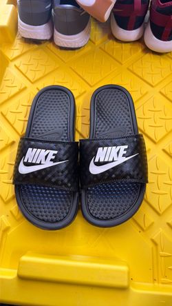 Nike slides.