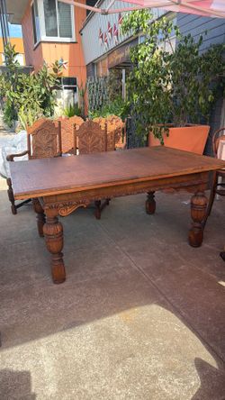 Antique beautiful dinner table with fold  out leaves Six beautiful Chairs