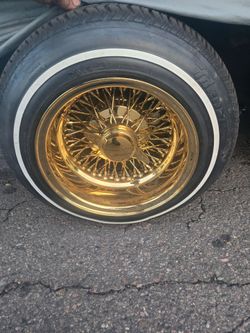 All gold cross lace wire wheels