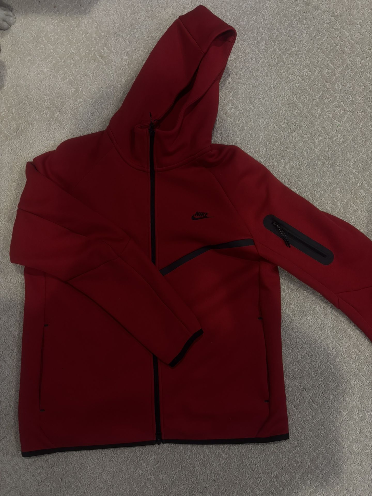 large red nike tech zip up