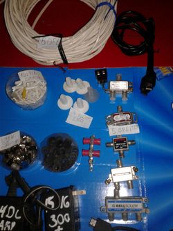 Assorted parts full cable TV including Transformers hooks plugs splitters Rubber seal connectors cable