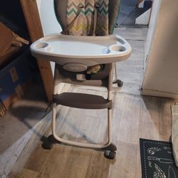 Fairly New Adjustable High Chair 