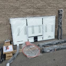 Goaliath 54 inch in ground basketball hoop, adjustable basketball court