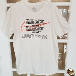 Nike White Tee with Orange Swoosh and Black Text Size: L