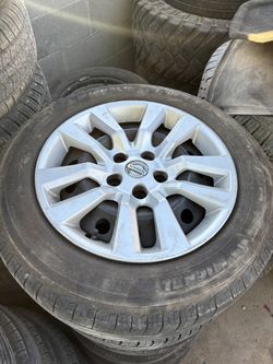 Nissan Altima 16 in steel wheels with tires
