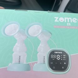 Breast Pump And Bottles 