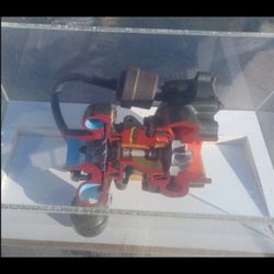 Turborcharger Cutaway In A Plastic Display Case 