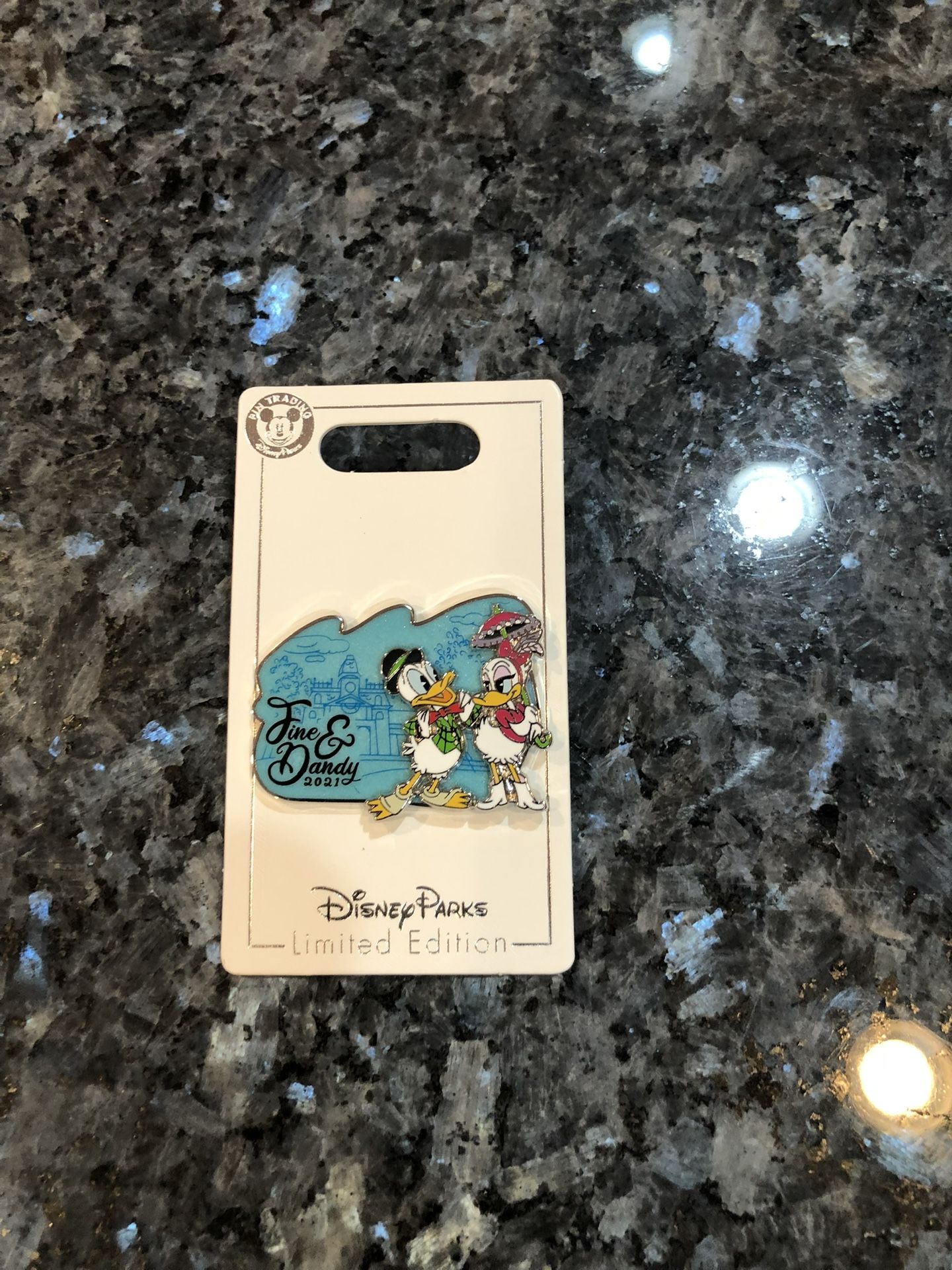 Collectible Disney Parks Donald Duck and Daisy Duck 2021 Fine & Dandy Trading Pin. Size 1 1/4 inches long and 1 1/2 inches wide. Brand New