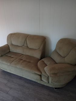 Really Cool Couch With Swiveling Chair On The End And Swiveling Chair