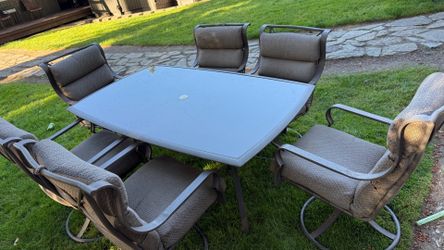 Patio table and 6 swivel chairs
