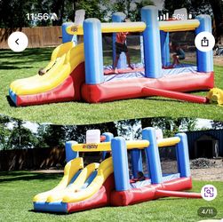 Inflatable bounce house with blower