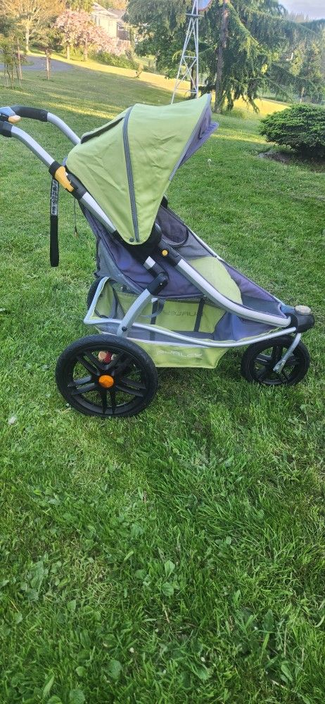Burley Solstice Jogging Stroller Folds, Locking Or Swivel Front Wheel