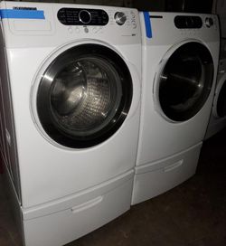Samsung front load washer & electric dryer set with pedestals working perfectly with 4 months warranty