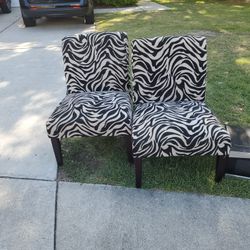 Pair Of Zebra print chairs 40