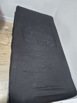 Metal bed frame and foam mattress: twin size