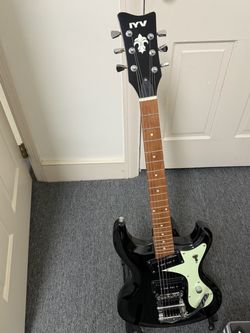 Like New Black/White Mosrite Copy Guitar! IYV Brand. Comes w/ gig bag. Plays and sounds beautifully! o