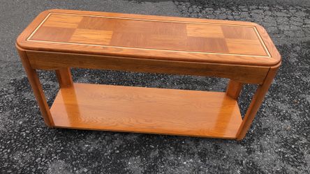 17x27x52 sold wood table very good condition