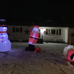 Five blowup outdoor 8 foot Christmas decorations for the lawn together all five