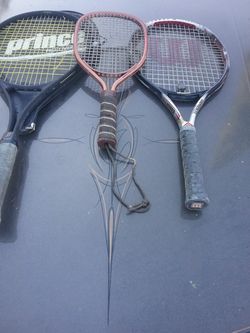 One Prince Oversize pro tennis racket one Wilson pro and a racket ball racket