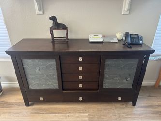 Large dark wood buffet / wine cabinet