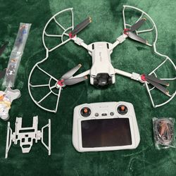DJI Mini 3 Drone + DJI RC (Screen Controller) – Never Used / Like New